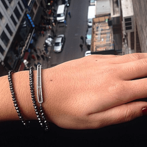 
                  
                    Black Diamond Gold Platinum Strand and Bar Bracelet - Alexandra Mor online
                  
                